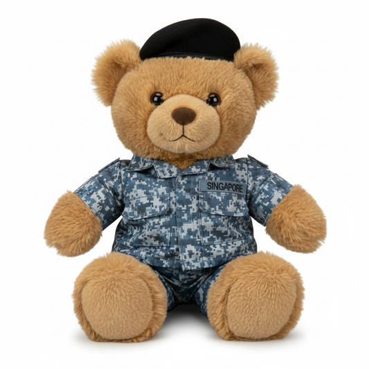 Plush teddy bear in Singapore Navy uniform on a white background