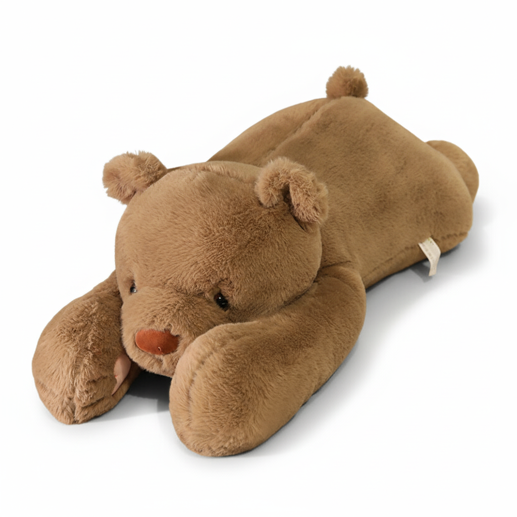 Brown teddy bear-shaped pillow on a white background