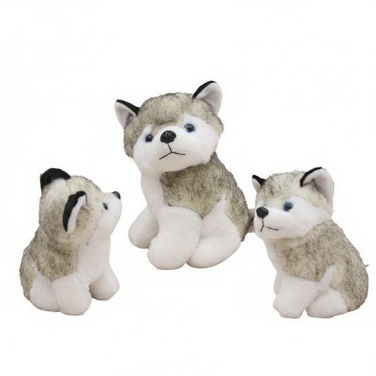 Three plush husky toys on a white background
