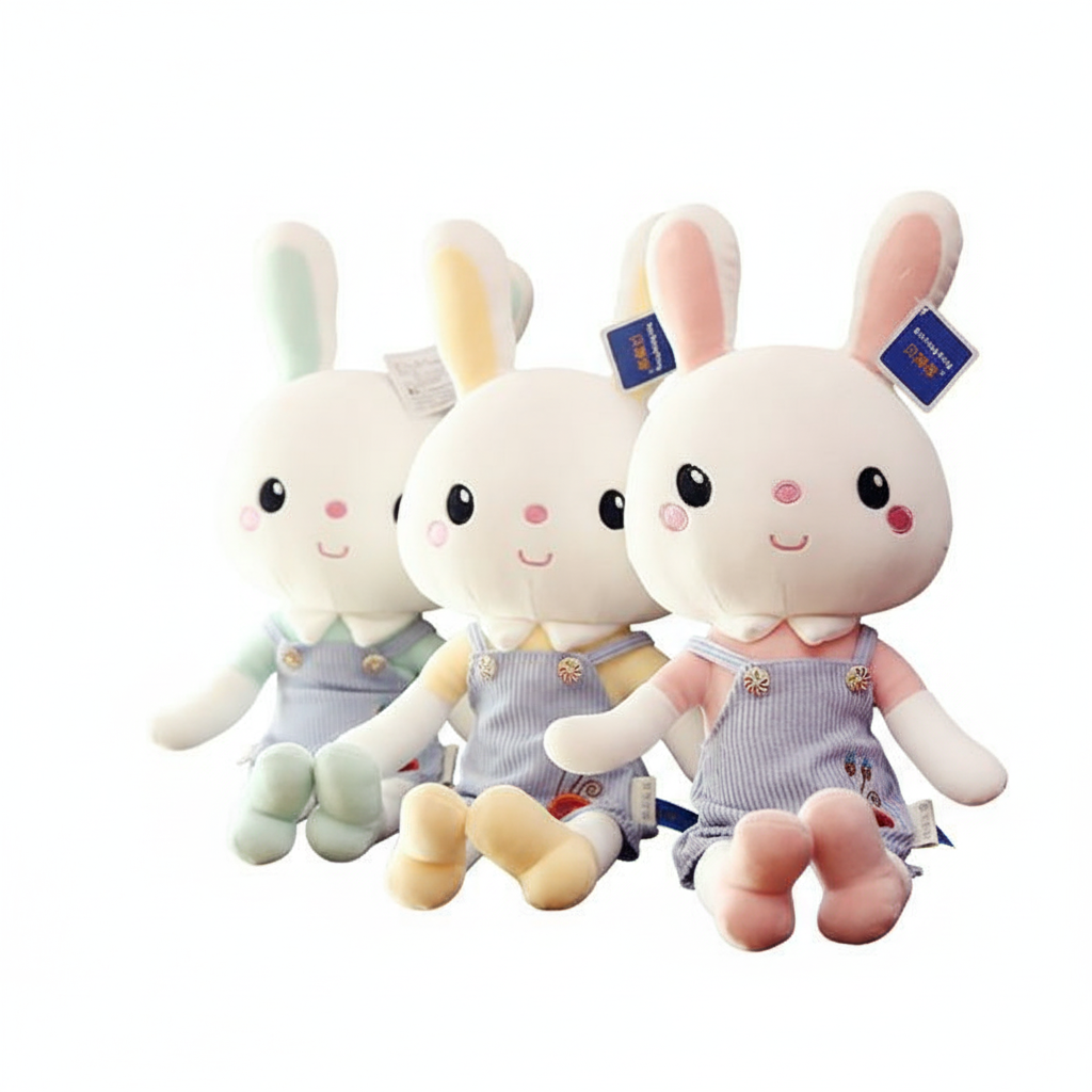 Three plush toys resembling bunnies in overalls on a white background